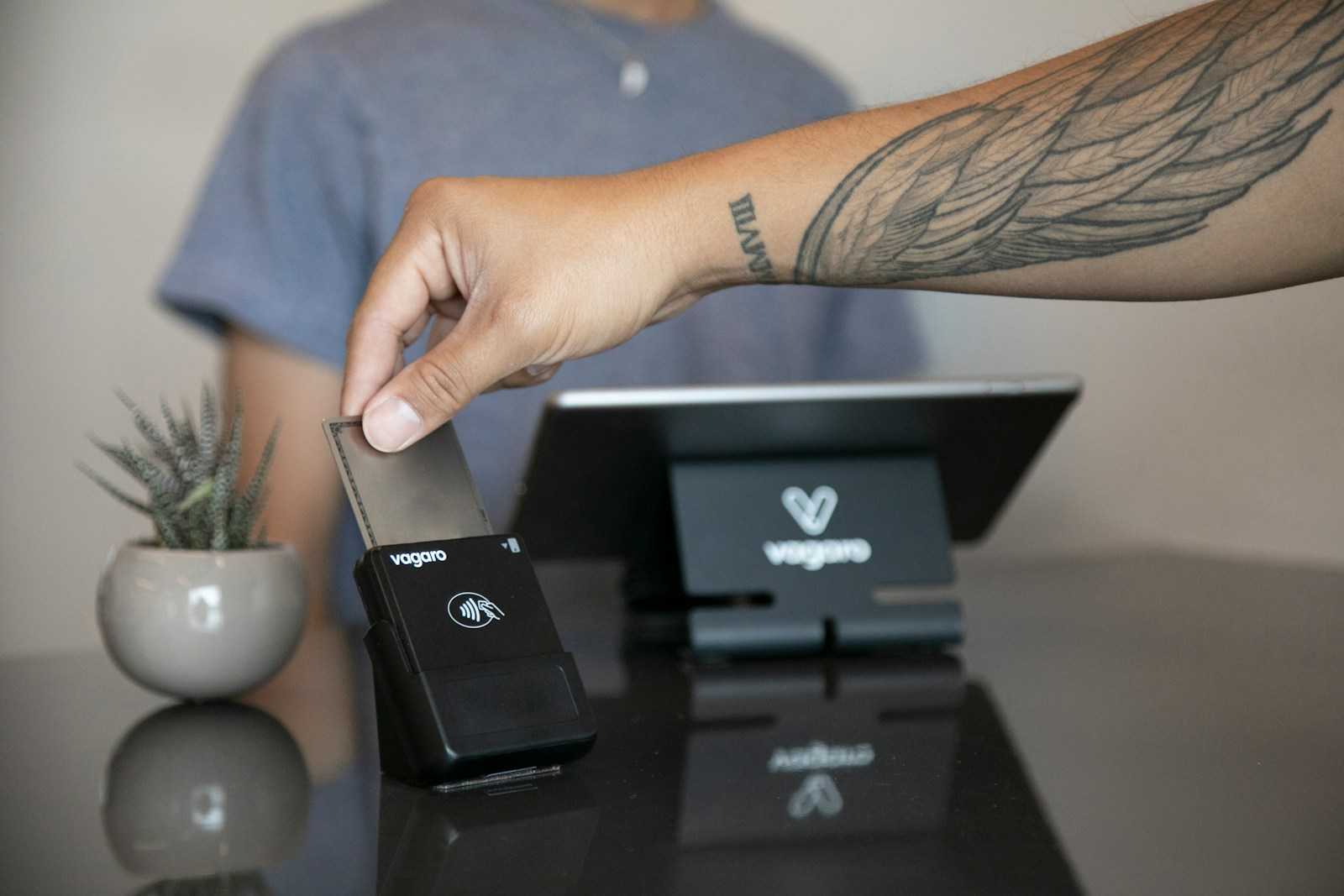 a person holding a device in their hand