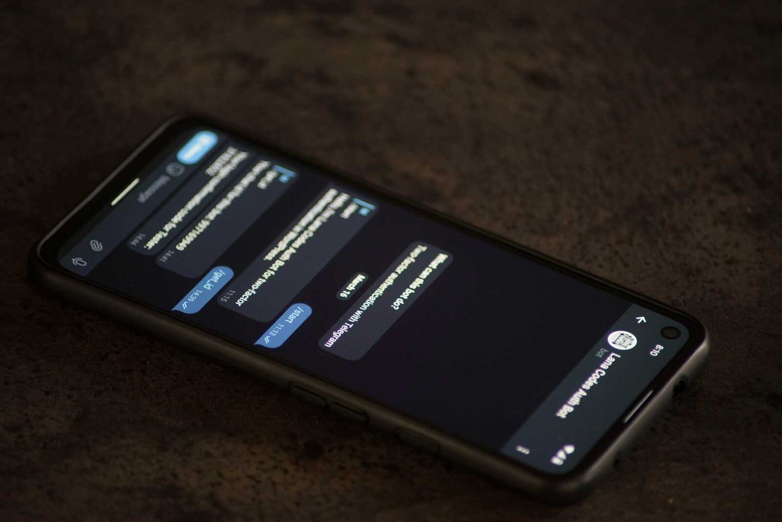 a close up of a cell phone on a table